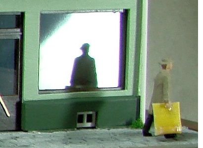 PREISER-Figur mit gelber Plastiktüte